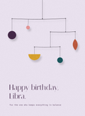 Happy birthday Libra card with a balanced hanging mobile on lilac