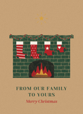 Christmas card with four stockings hung by a crackling fireplace